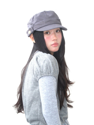 black peaked cap