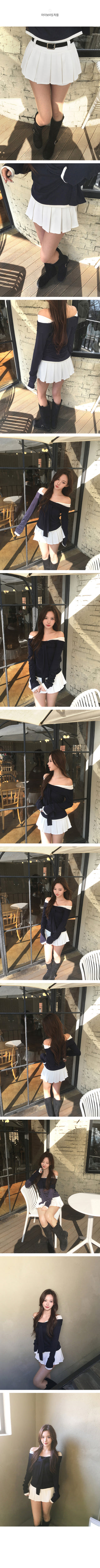 Belted pleated mini skirt