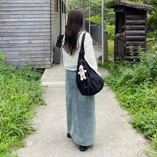 Drawstring pocket shoulder bag