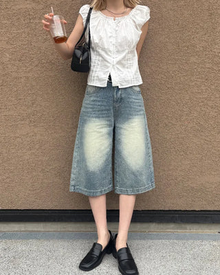 High-waisted flared Bermuda denim pants