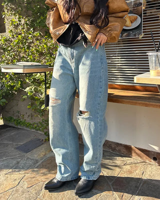Knee-damaged vintage denim pants