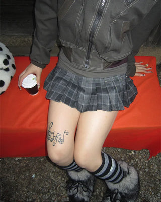 Tartan check studded mini pleated skirt