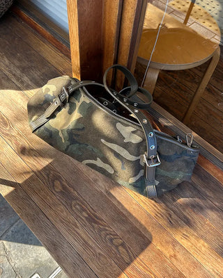 Leather eyelet hand leopard tote bag