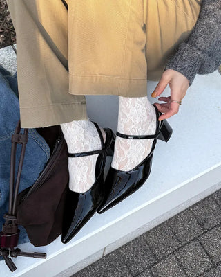 Pointed-toe strap heels