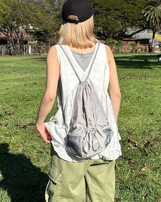 Drawstring net pocket backpack