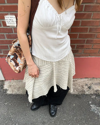 Unique strap cut-off midi skirt