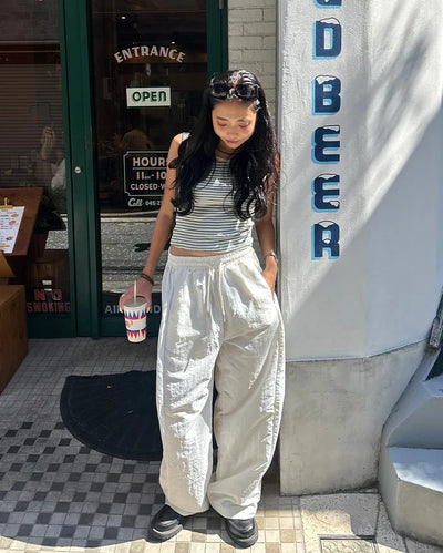 Wide-leg nylon jersey pants with hip pockets