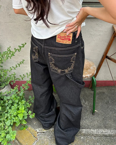 Back pocket stitch wide rigid denim pants