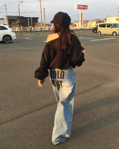 Hip-damaged denim pants