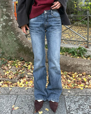 Low-waist point-washed flare jeans
