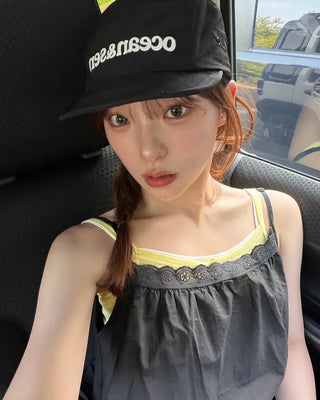 Layered button sleeveless top with built-in cups