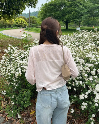 See-through perforated cardigan