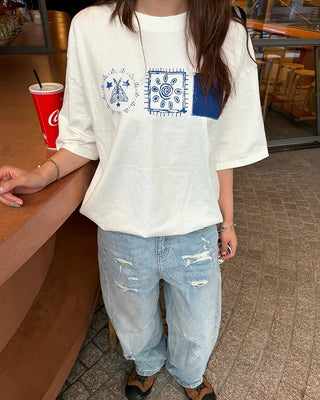 Distressed wide-leg denim
