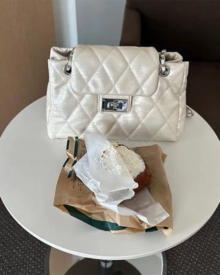 Quilted buckle mini shoulder bag