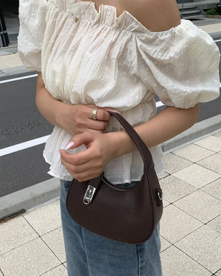 Feminine gathered off-shoulder blouse