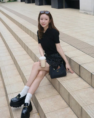 Cable knit short-sleeved sweater