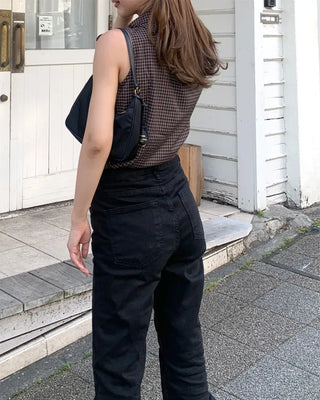 Checkered high-neck sleeveless blouse with bow tie