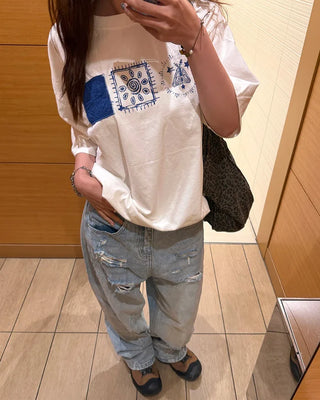 Distressed wide-leg denim