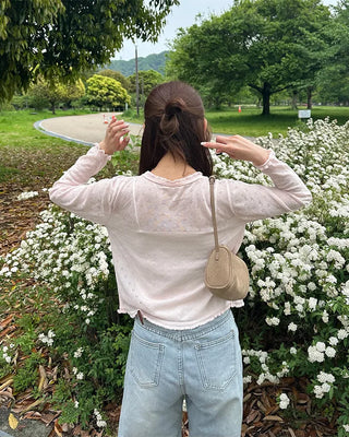 See-through perforated cardigan