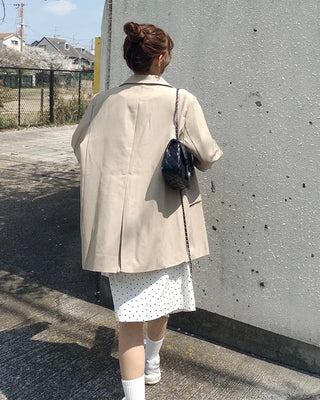 Polka dot asymmetrical midi skirt