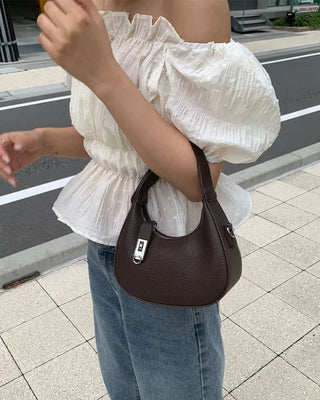 Feminine gathered off-shoulder blouse