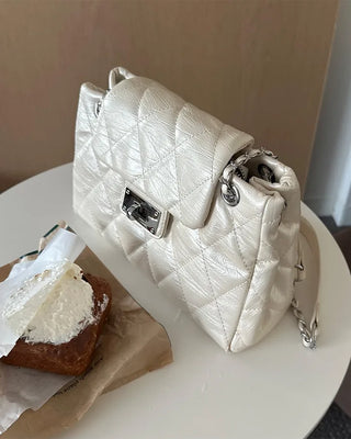 Quilted buckle mini shoulder bag