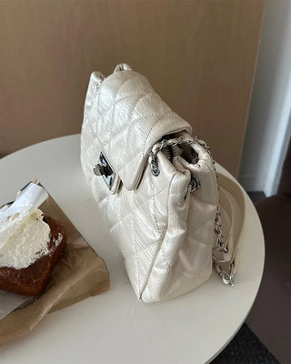 Quilted buckle mini shoulder bag