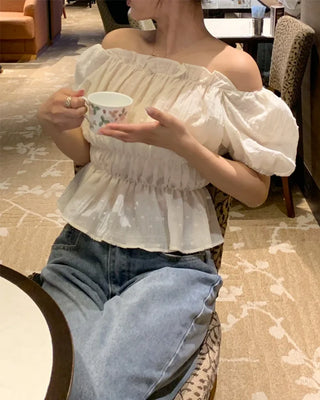 Feminine gathered off-shoulder blouse