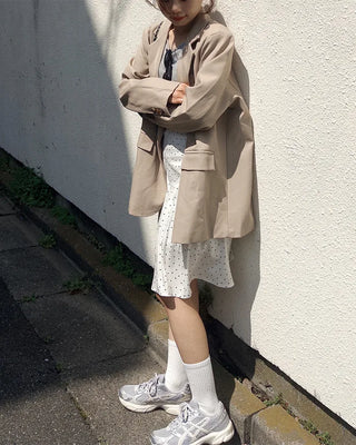 Polka dot asymmetrical midi skirt