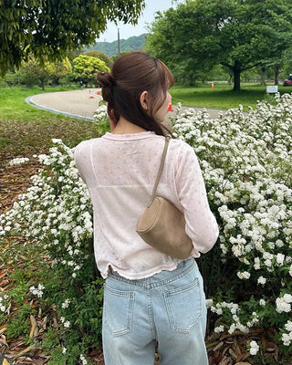 See-through perforated cardigan