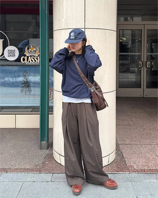 Drape-form buckle shoulder bag