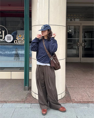 Drape-form buckle shoulder bag
