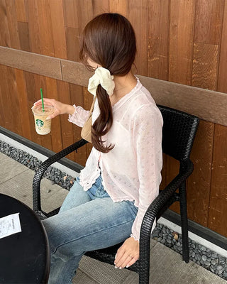 See-through perforated cardigan