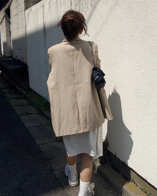 Polka dot asymmetrical midi skirt