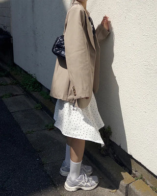 Polka dot asymmetrical midi skirt
