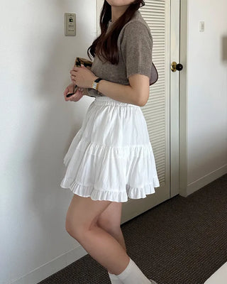 Elastic waist cantilever mini skirt