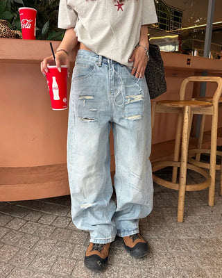 Distressed wide-leg denim