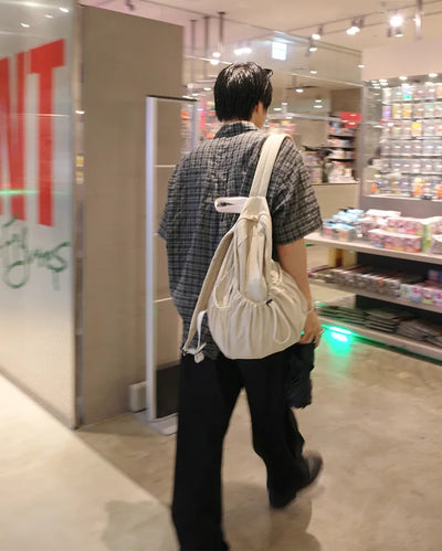 Drawstring pocket backpack