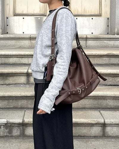 Drape-form buckle shoulder bag