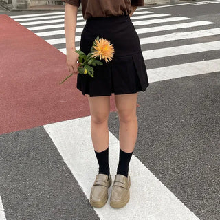 Pleated mini skirt