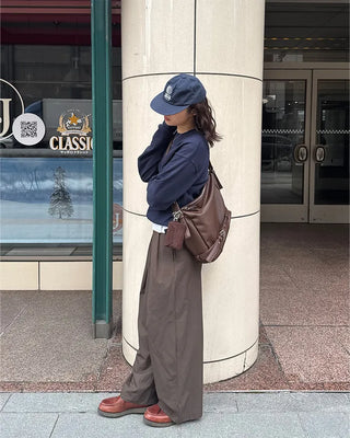 Drape-form buckle shoulder bag
