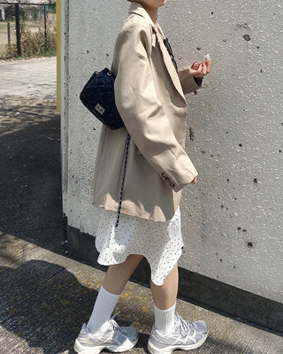Polka dot asymmetrical midi skirt