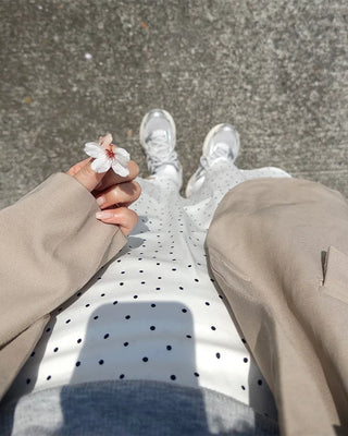 Polka dot asymmetrical midi skirt
