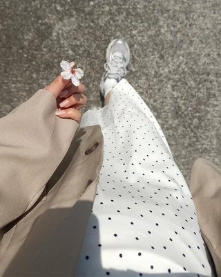 Polka dot asymmetrical midi skirt