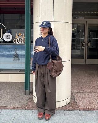 Drape-form buckle shoulder bag