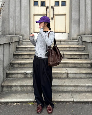 Drape-form buckle shoulder bag