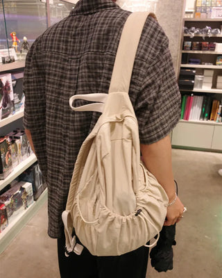 Drawstring pocket backpack