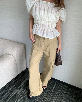 Feminine gathered off-shoulder blouse