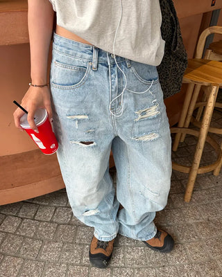 Distressed wide-leg denim