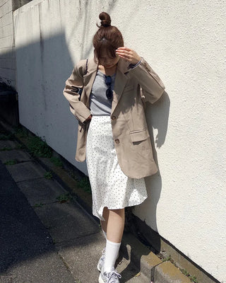Polka dot asymmetrical midi skirt
